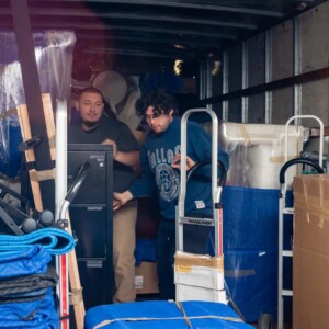 Moving boxes and furniture in new home